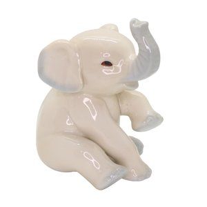 PG Handcrafted in Malaysia Porcelain Sitting Baby Elephant White and Blue
